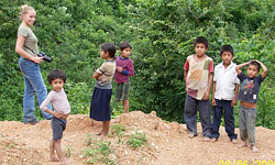 student with local children 