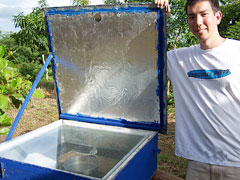 Student with solar cooker